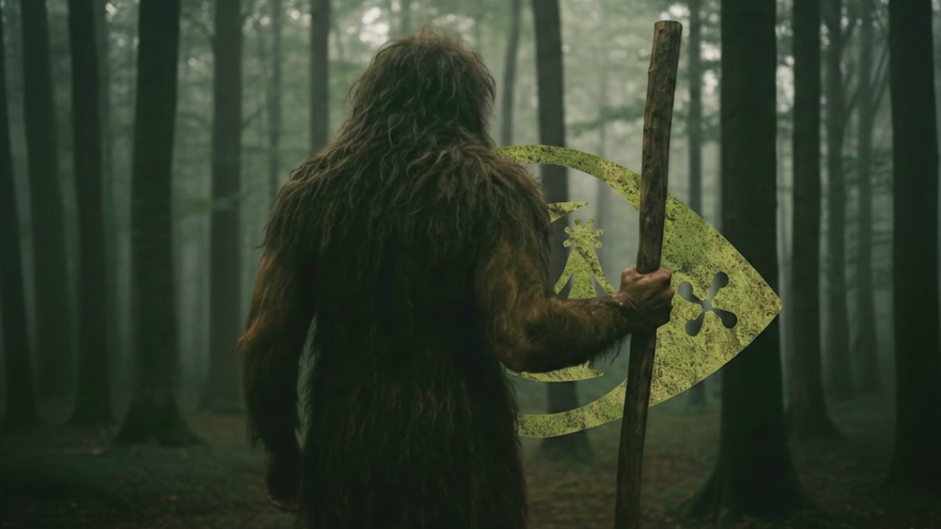 Basajaun basoan ibiltzen, aztarna logoarekin.